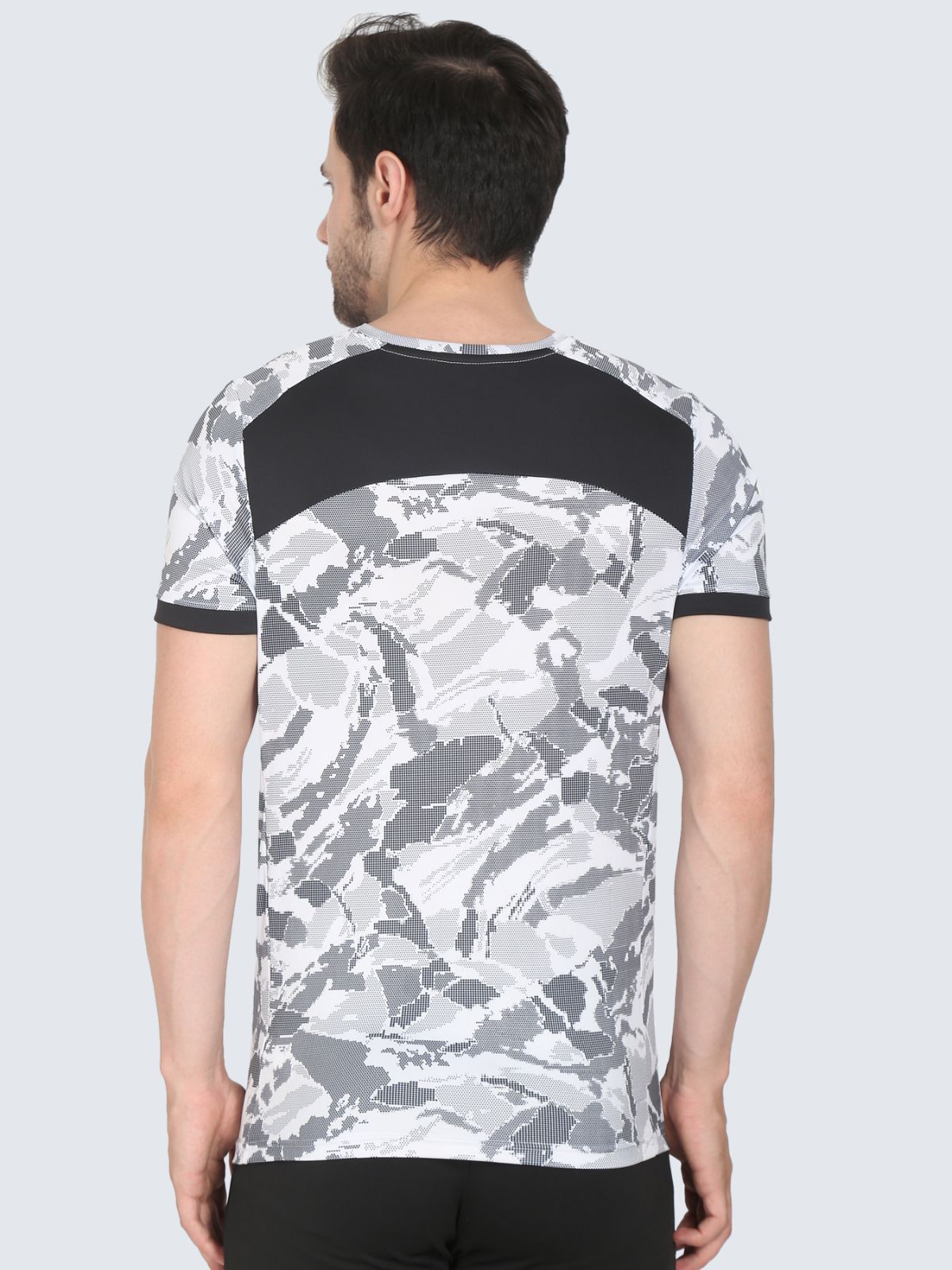 Back view of white camo T-shirt with black yoke panel on a white background