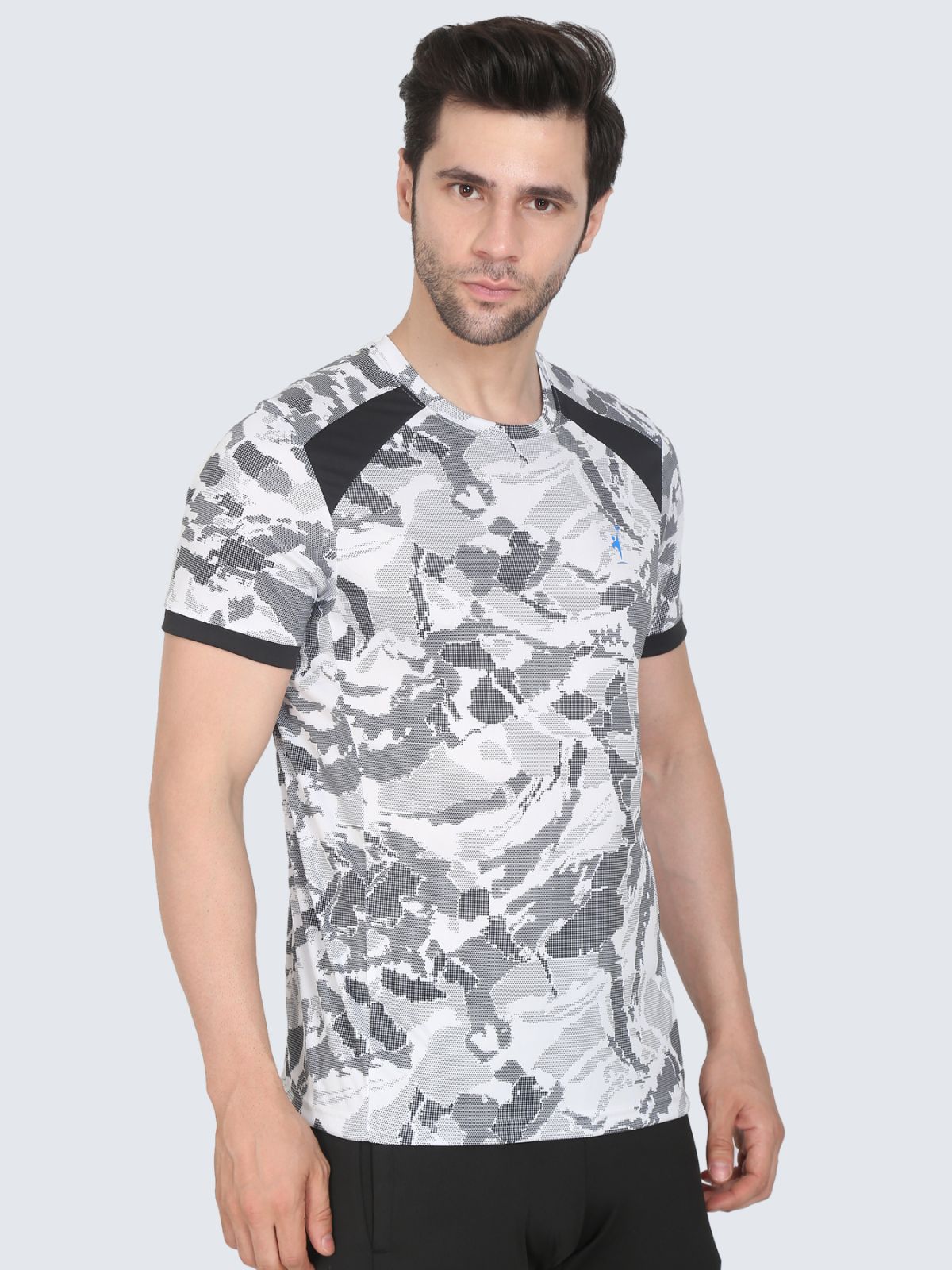 Three-quarter view of white camo T-shirt with black shoulder panels on a white background